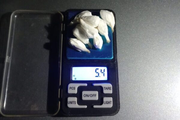 Arma, cocaína, comodoro, droga, policía